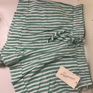 Green and white striped shorts